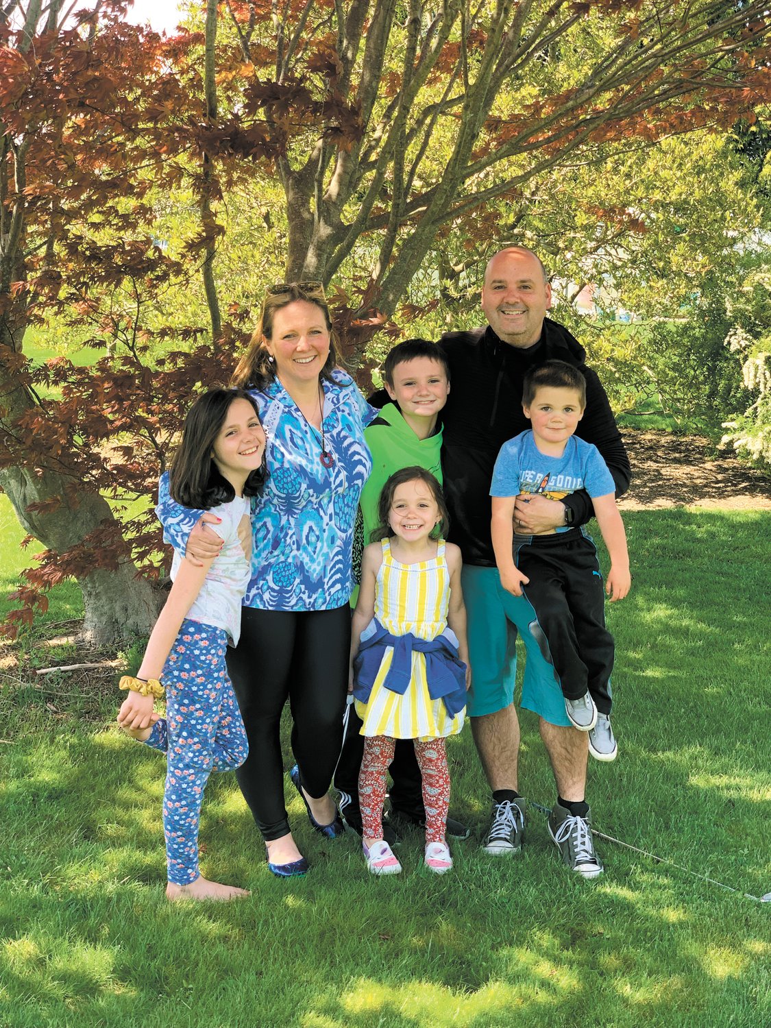 NEW FOSTER PARENTS: Tori and DJ Canario became foster parents in September 2021 and have had two placements of children during that time. The couple is currently fostering three teenagers while raising four children of their own. (From left) Rylee Canario (9), Tori Canario, Mikey Canario (11), Hannah (6), Dennis Canario and Danny Canario (4).